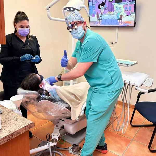 A patient receiving an exam from Dr. Carlos Benavides